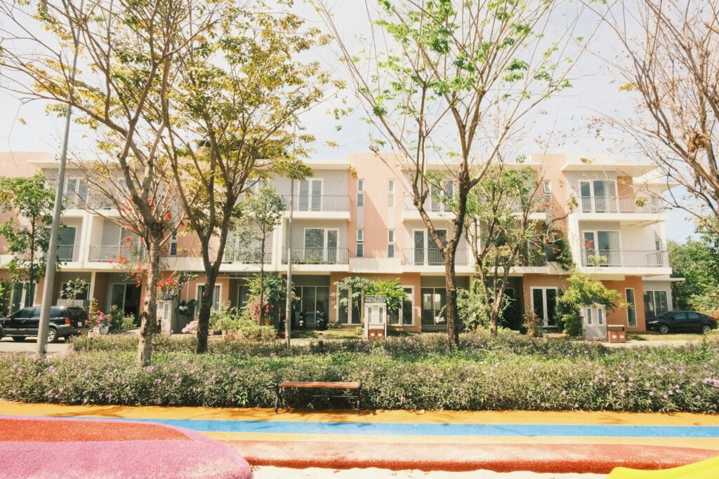 Row of townhomes with trees and landscaping